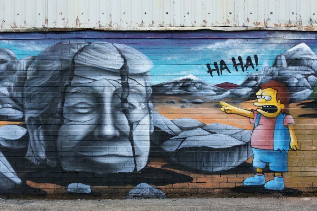 A mural depicting Donald Trump being laughed at by a character from The Simpsons is seen at Islington Mill on November 08, 2020 in Salford, England. Former US Vice President Joe Biden was projected to be victor of this week's presidential election against