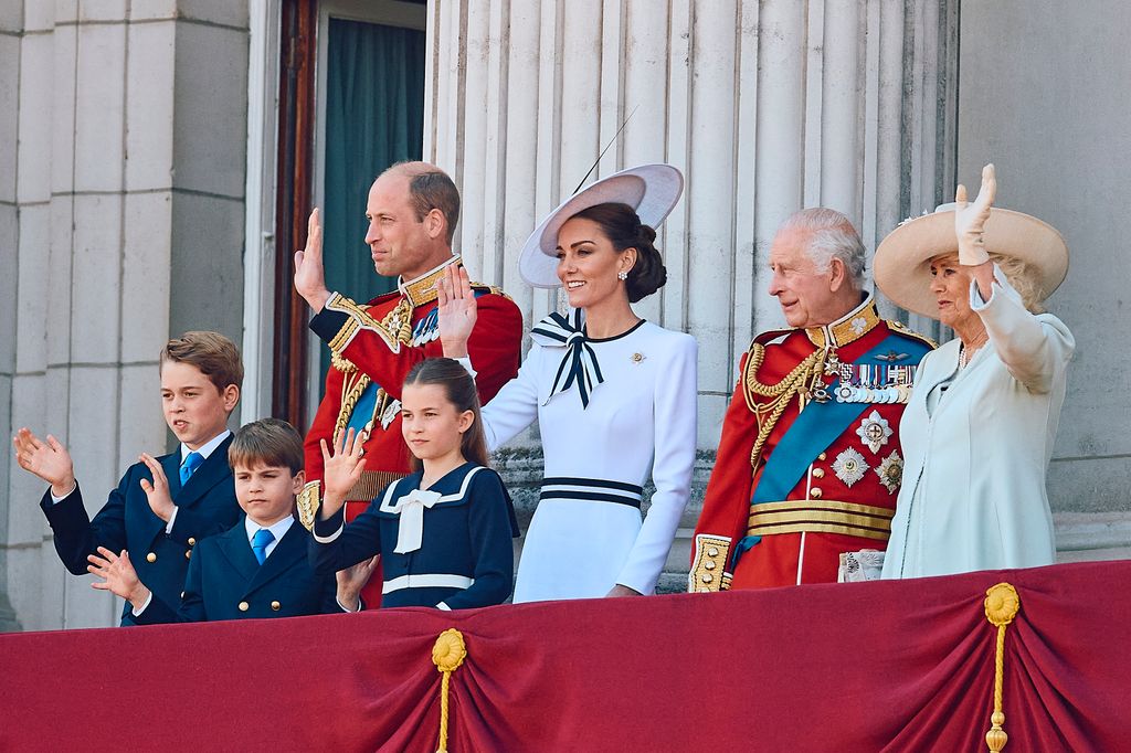 Prince William, Kate Middleton, King Charles and Queen Camilla wave on the balcony of Buckingham Palace