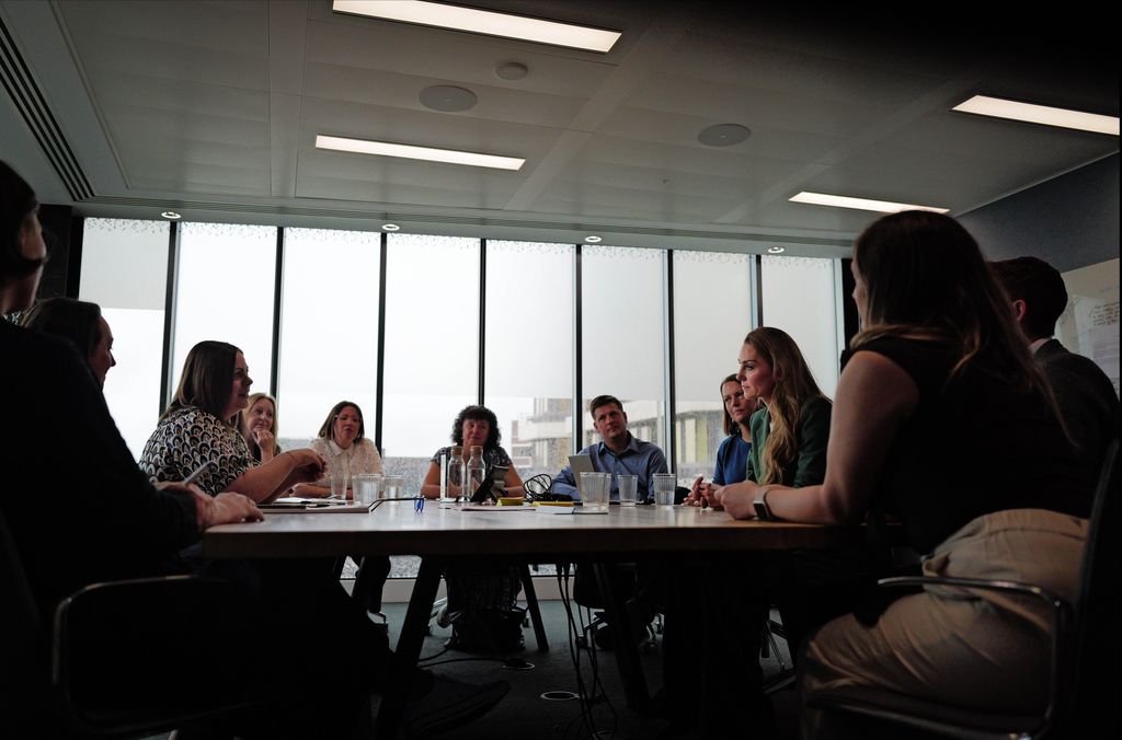 Kate Middleton sitting at boardroom meeting