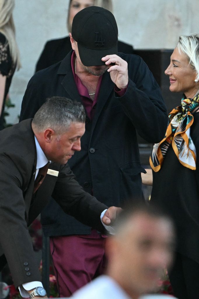 US actor Leonardo Dicaprio leaves the Gritti Palace Hotel for a party on the third day of the wedding of US Amazon founder Jeff Bezos with Lauren Sanchez