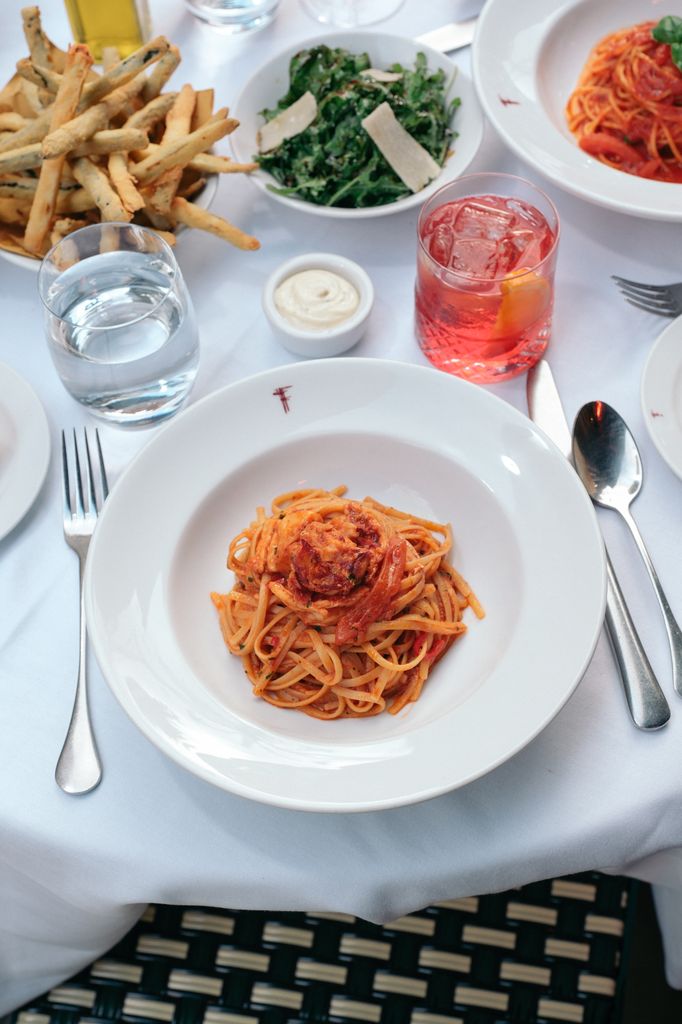 bowl of pasta on white table 