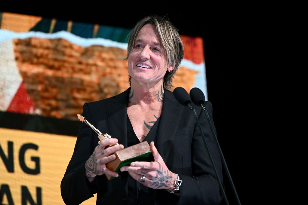 Keith Urban accepts his award onstage for Top-Selling Australian Country Album for 2024 at the Golden Guitar Awards during the 53rd Tamworth Country Music Festival in Tamworth, Australia, 25 January 2025.