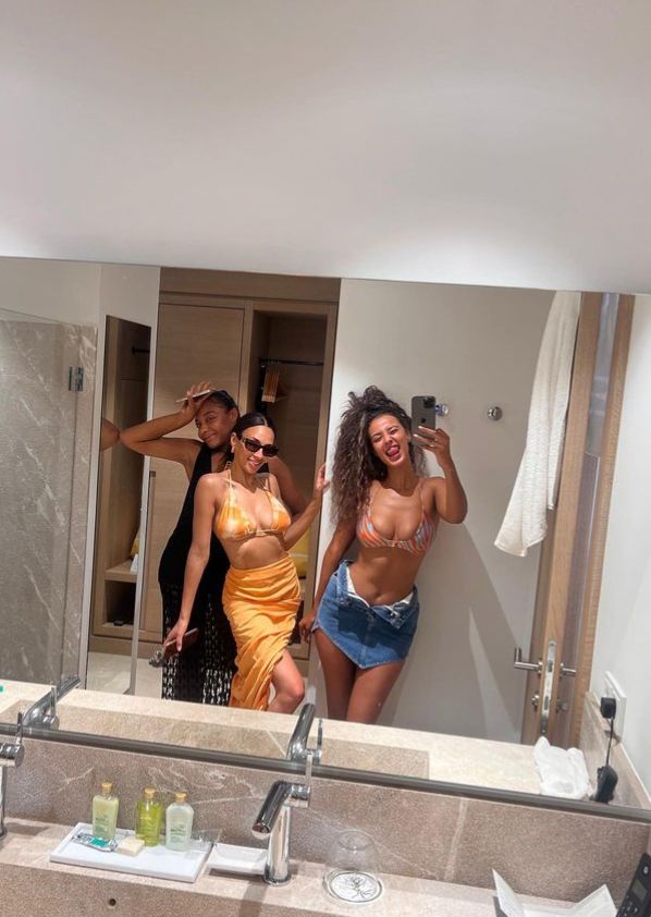 Maya Jama and two friends in bikini tops