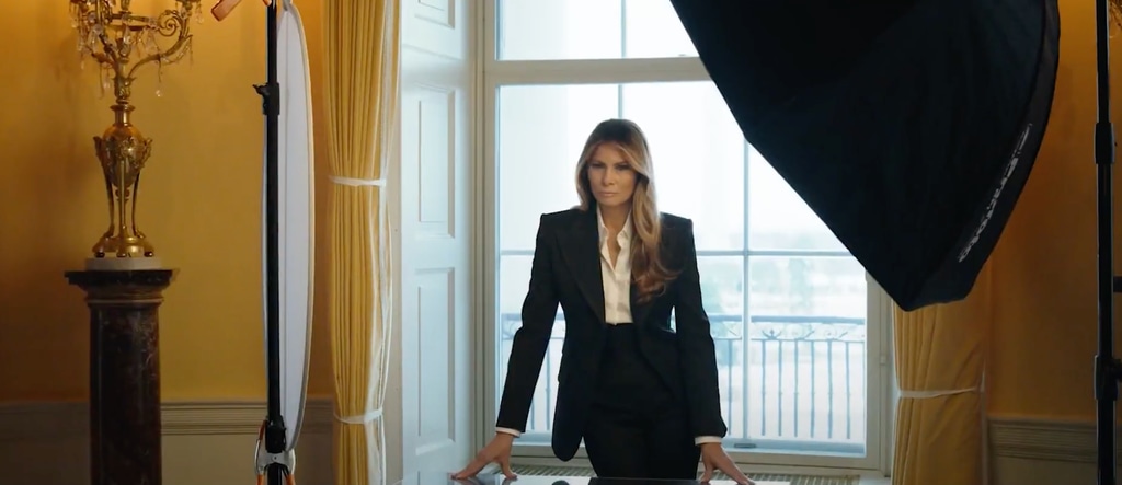 Melania Trump in black suit posing for her offical portrait