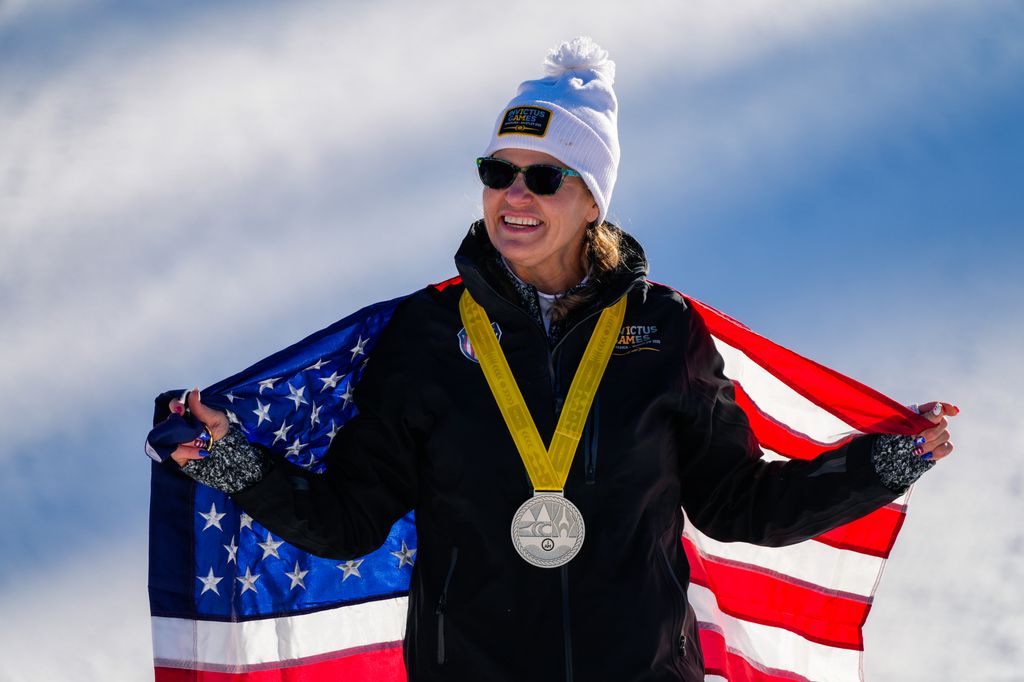 Jacquelyn Marty of Team USA celebrates with her silver medal after the Alpine event during the Invictus Games Vancouver Whistler 