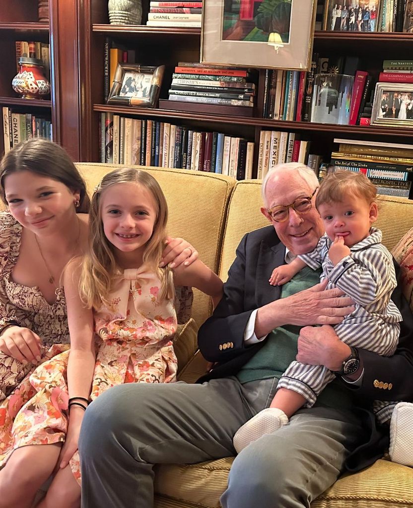 Photo shared by Drew Barrymore's ex-husband Will Kopelman's wife Allie Michler featuring the former couple's daughters Olive and Frankie posing next to their late grandfather Arie Kopelman and their younger half brother John