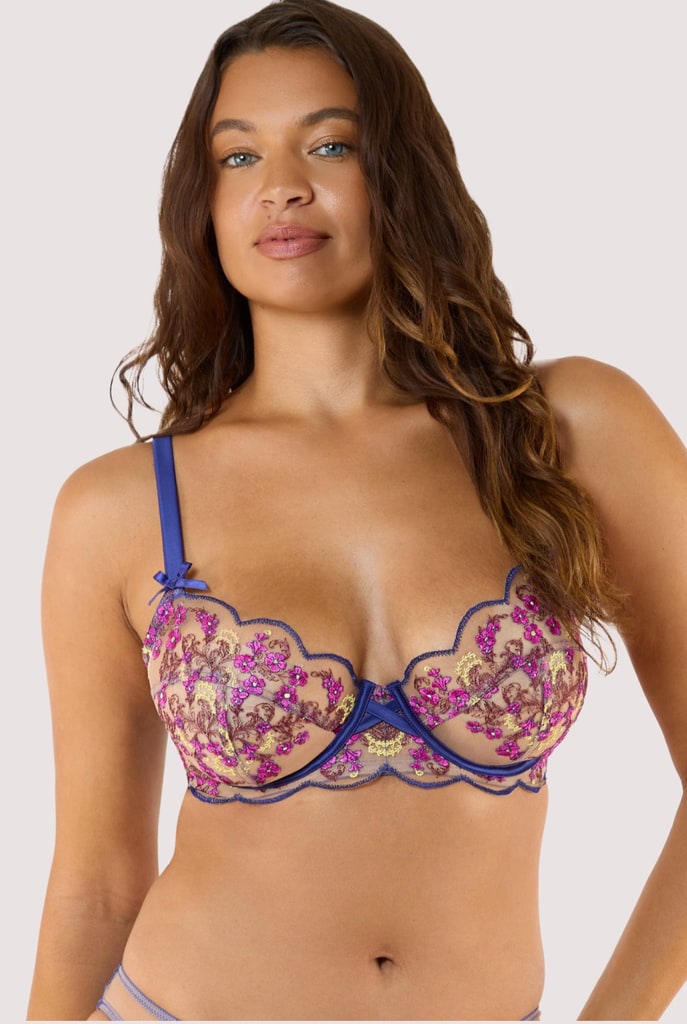 model in floral bra with blue straps