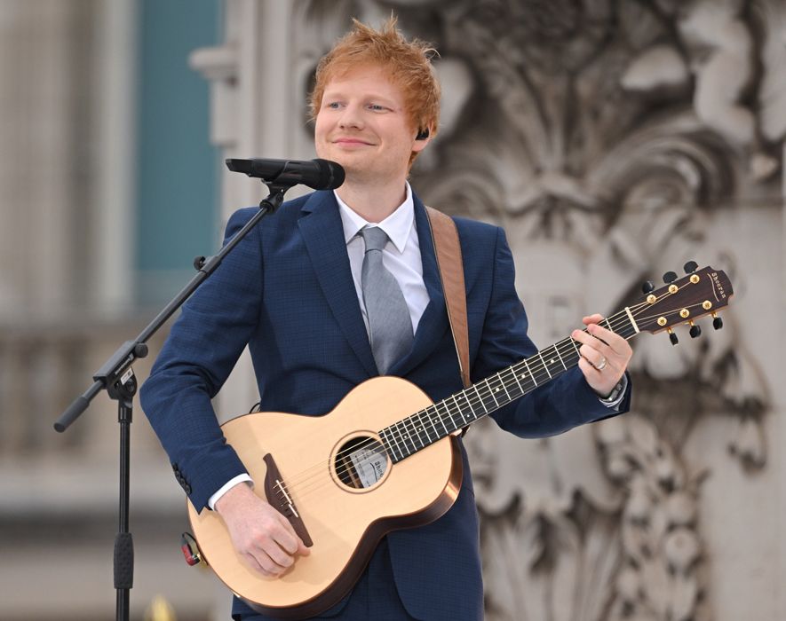 ed sheeran in a blue suit performing at the Platinum Jubilee