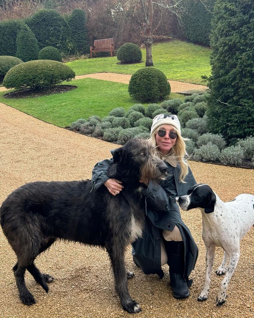 Trudie with her beloved dogs