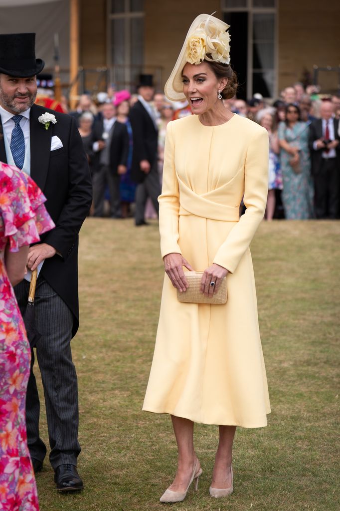 Catherine, Princess of Wales greets guests during a Royal Garden Party at Buckingham Palace on May 20, 2025 in London, England.