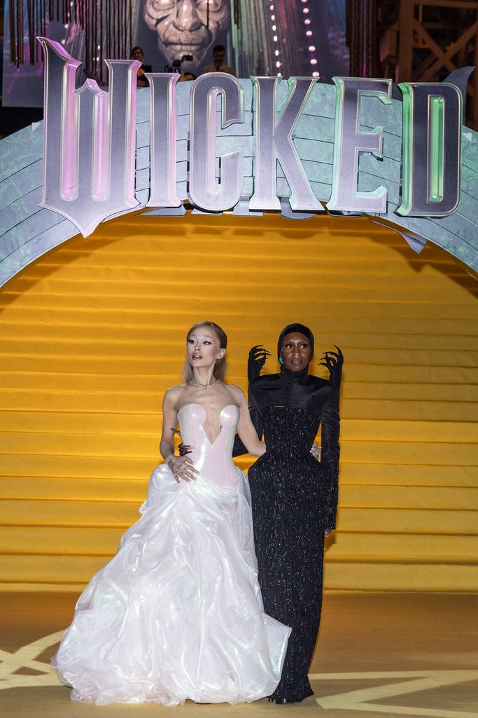 Actress Ariana Grande and Cynthia Erivo pose on the yellow carpet "Wicked: Part One" at Auditorio Nacional on November 11, 2024 in Mexico City, Mexico.