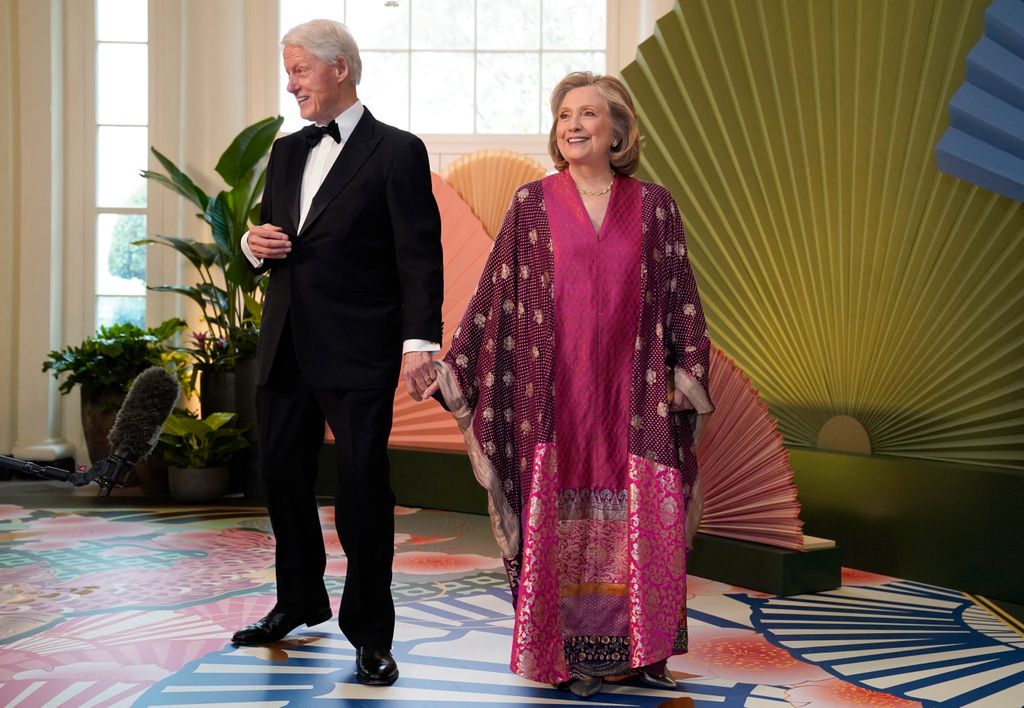Bill Clinton, 42nd US President and his wife Hillary Rodham Clinton, 67th US Secretary of State arrive for a State Dinner in honor of Japanese Prime Minister Fumio Kishida