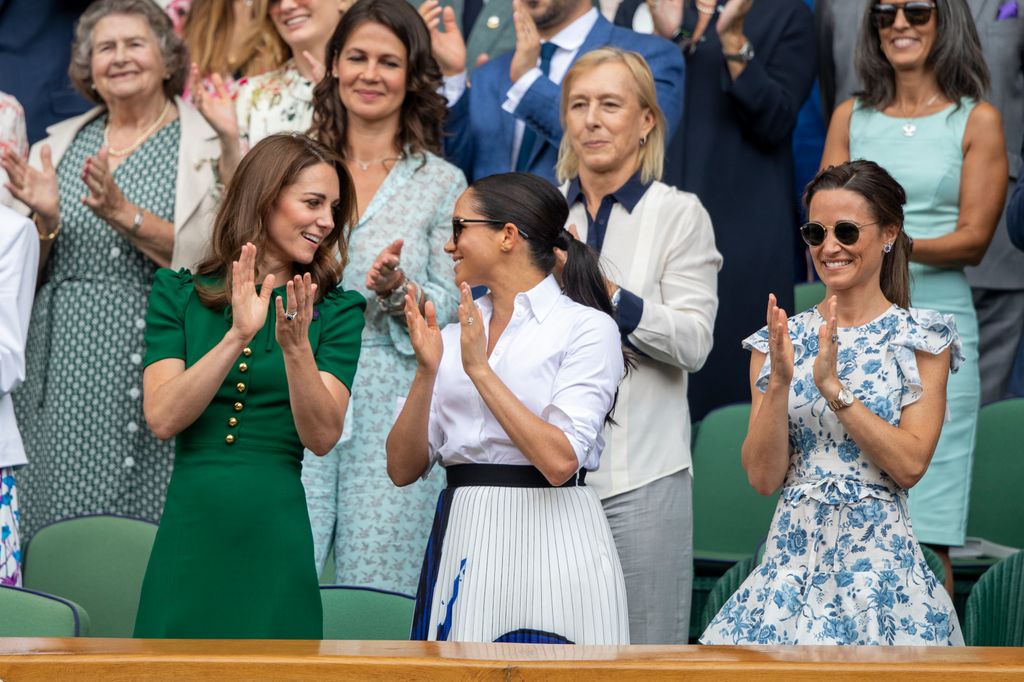 Catherine, Princess of Wales and Meghan Markle, Duchess of Sussex, and Pippa Middleton in the Royal Box on Centre Court applaud the winner Simona Halep of Romania after her victory against Serena Williams during the Ladies Singles Final at Wimbledon on July 13, 2019 in London, England