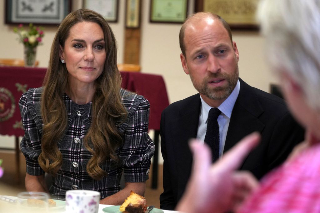 Britain's Catherine, Princess of Wales and Britain's Prince William, Prince of Wales visit the National Federation of Women's Institute (WI) in Sunningdale, west of London on September 8, 2025, to commemorate the three-year anniversary of the death of William's late grandmother Queen Elizabeth II. The Prince will meet with members from Sunningdale WI there and across Berkshire to hear about the work of the WI and how it gives opportunities for women to socialise, learn new skills and engage in community projects. (Photo by Alastair Grant / POOL / AFP) (Photo by ALASTAIR GRANT/POOL/AFP via Getty Images)          