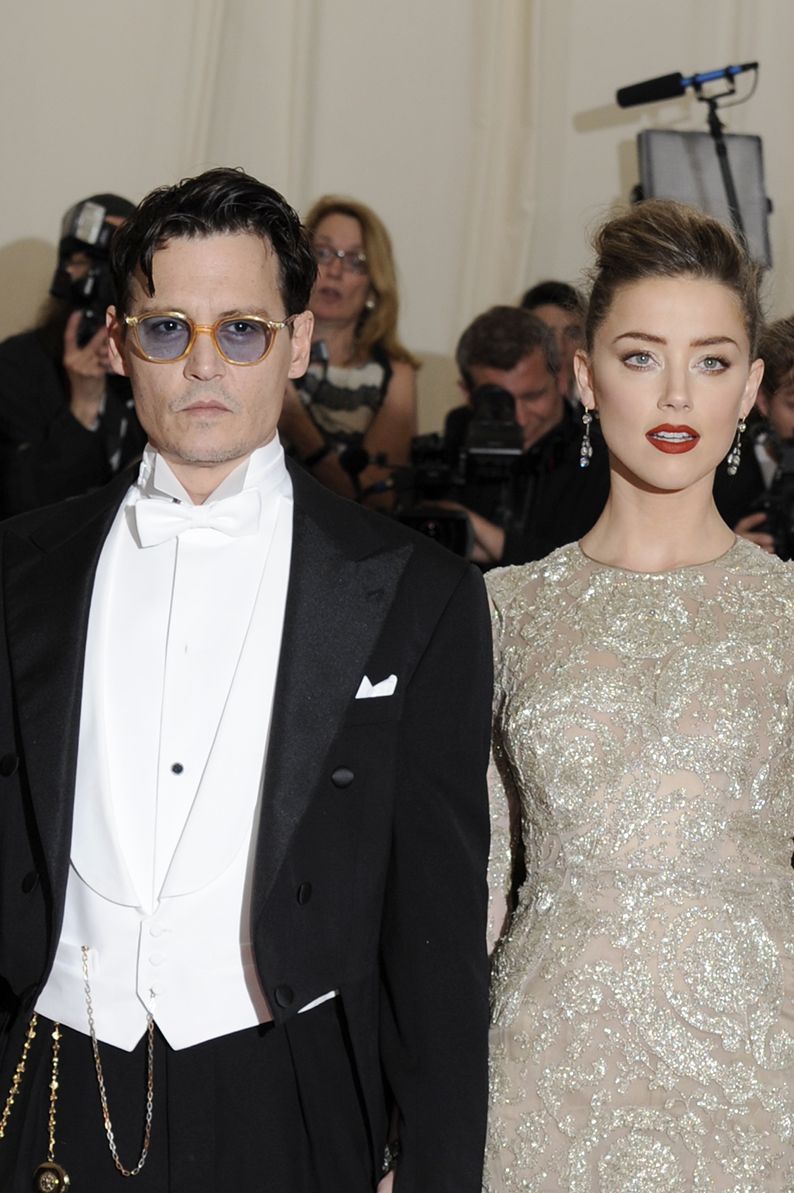 Johnny Depp and Amber Heard attend the 'Charles James: Beyond Fashion' Costume Institute Gala at the Metropolitan Museum of Art on May 5, 2014 in New York City