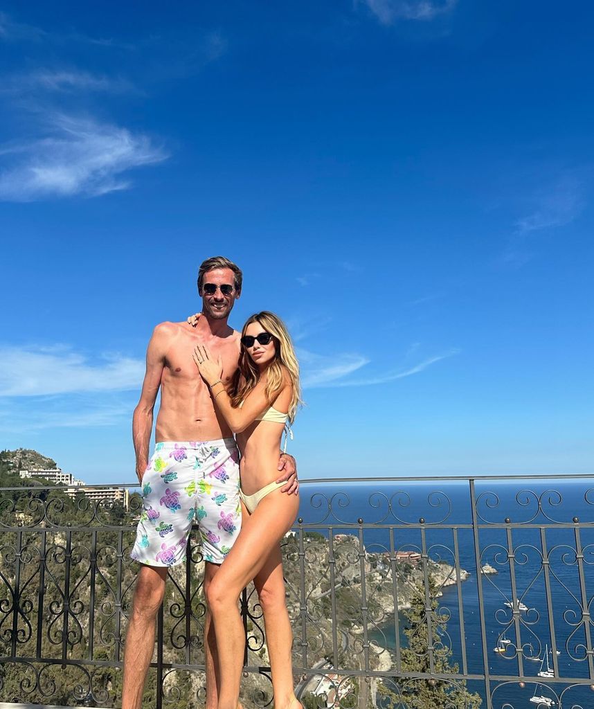 Abbey Clancy in whitw bikini and Peter Crouch shirtless in swimming trunks