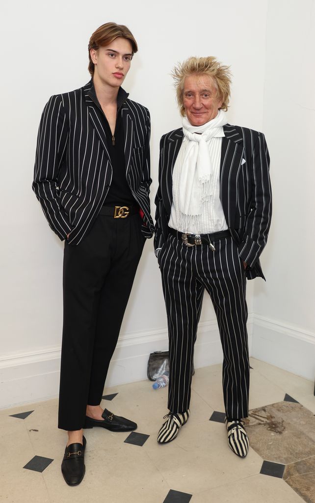 Rod Stewart and son Alistair in matching striped black and white suits