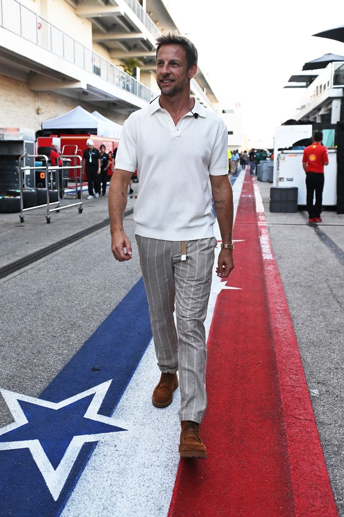 Jenson Button walks in the Paddock during the F1 Grand Prix of United States at Circuit of The Americas on October 20, 2024 in Austin, Texas