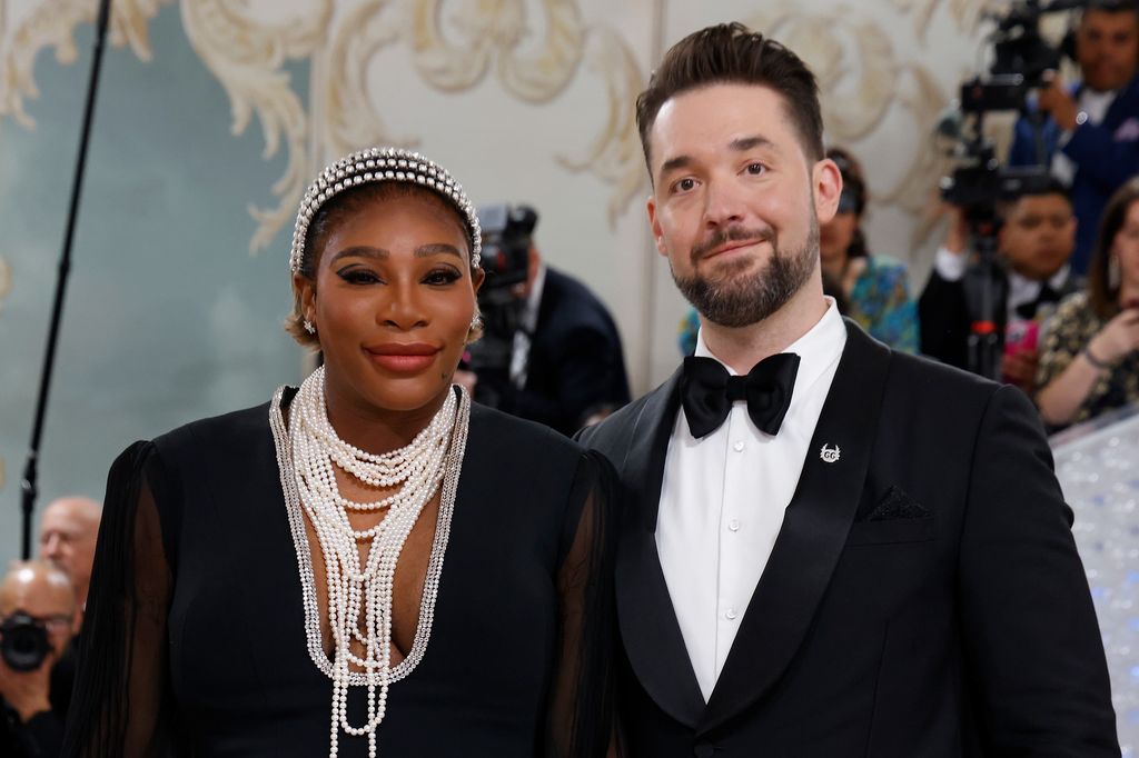 Serena Williams in pearls and black dress and Alexis Ohanian in tuxedo at the 2023 Met Gala