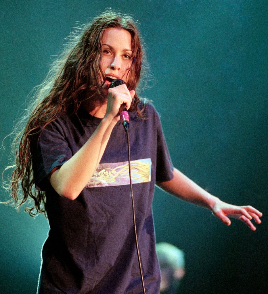 ATLANTA SEPTEMBER 14: Alanis Morissette performs at The Omni Coliseum in Atlanta Georgia, September 14,1996 (Photo by Rick Diamond/Getty Images)