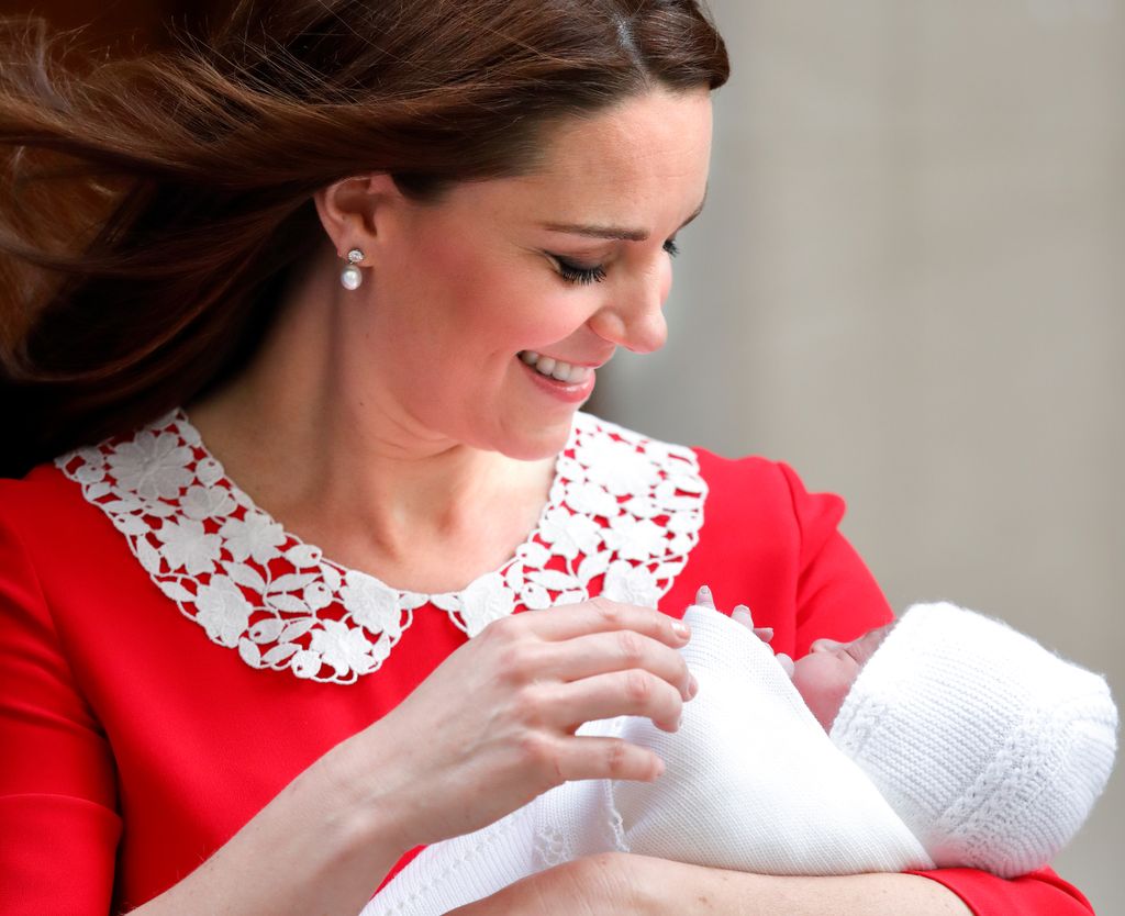 Princess Kate carrying a baby Prince Louis