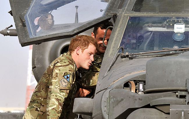 Prince Harry looking in a helicopter