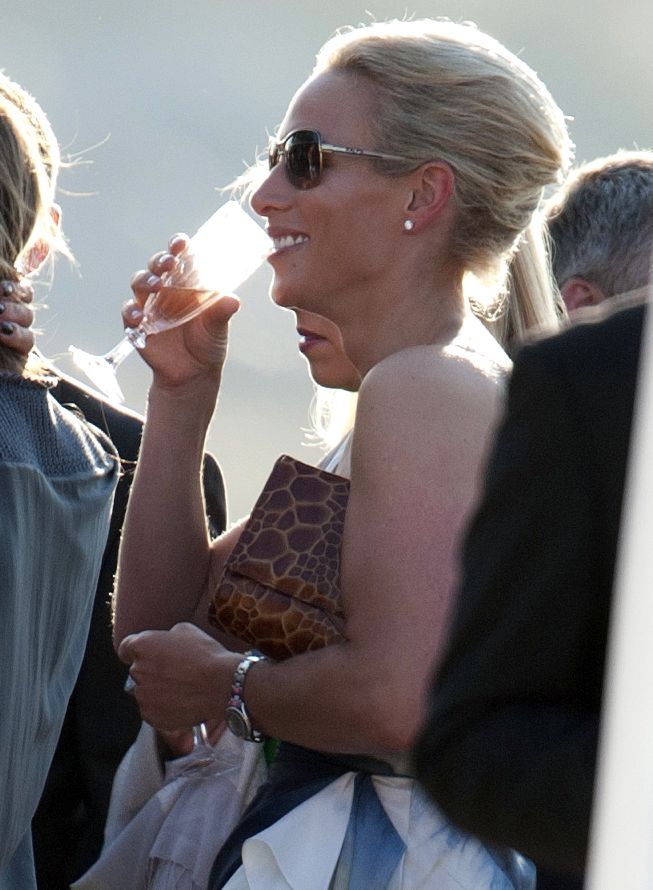 Zara Phillips sipping champagne at her pre wedding reception