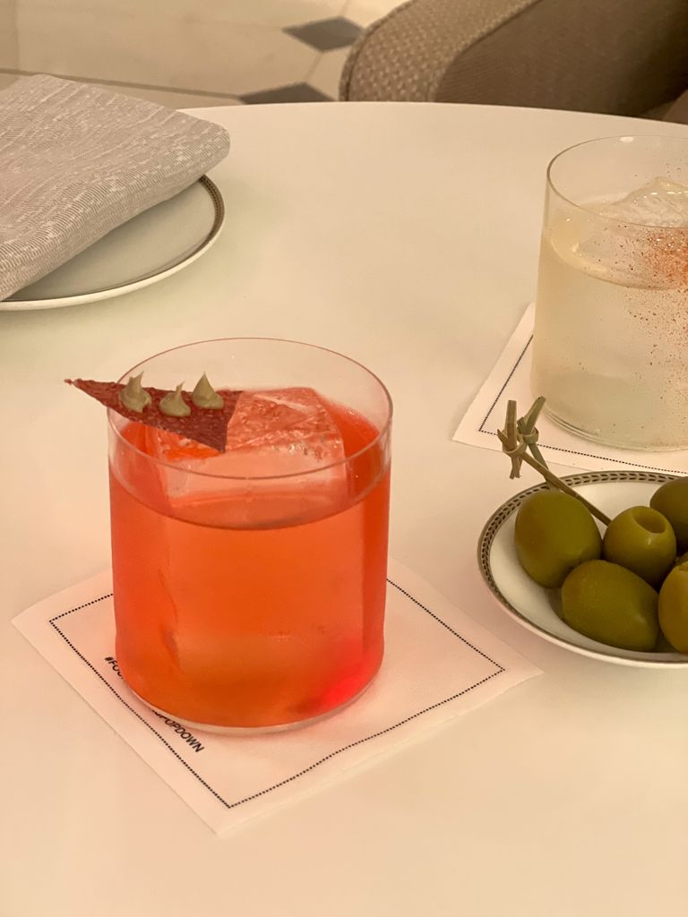cocktail with olives in a dish