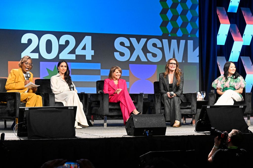 Meghan on stage with Errin Haines, Katie Couric, Brooke Shields and Nancy Wang Yuen
