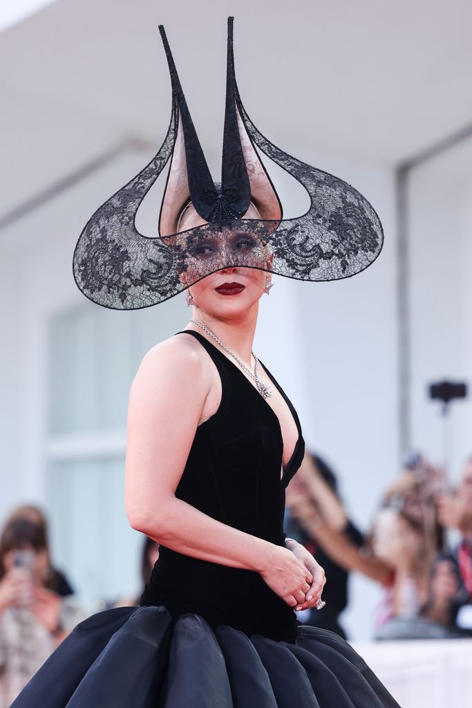 The singer wore a striking headpiece by prolific milliner Philip Treacy