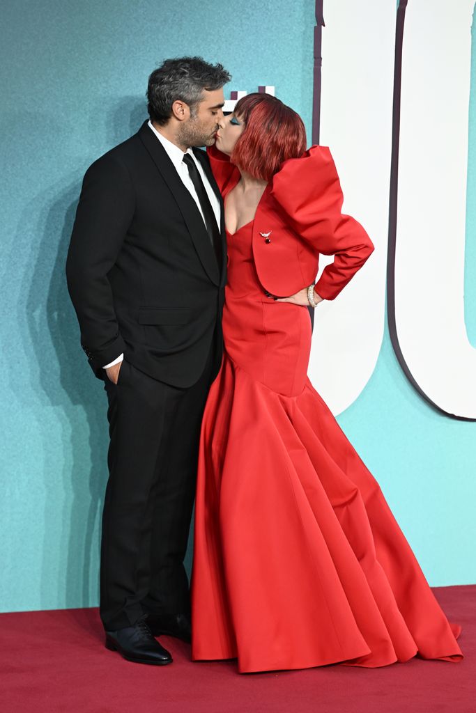 Michael Polansky and Lady Gaga kiss on the red carpet