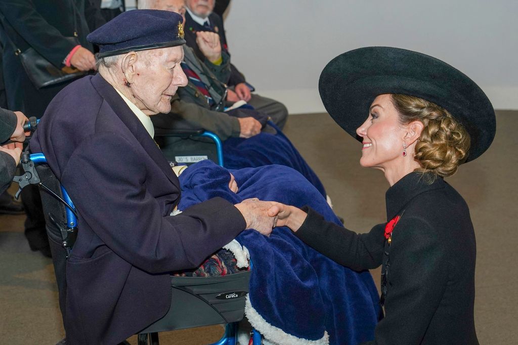 Princess Kate speaks with veterans during an Armistice Day service at The National Memorial Arboretum     
