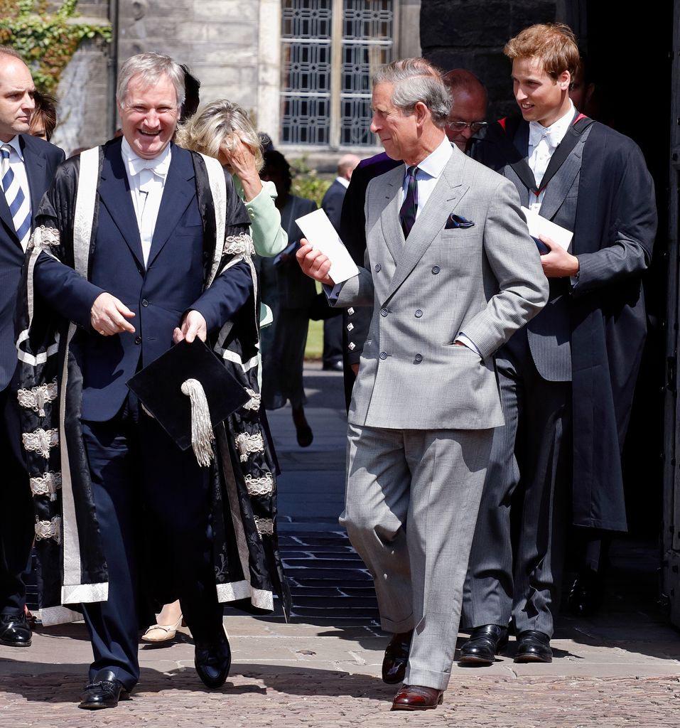 Prince Charles talks with Brian Lang, Principal and Vice Chancellor of the University of St. Andrews, after accompanying Prince William to his graduation ceremony