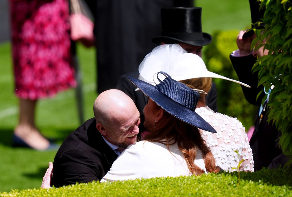 Mike Tindall hugs Sarah, Duchess of York