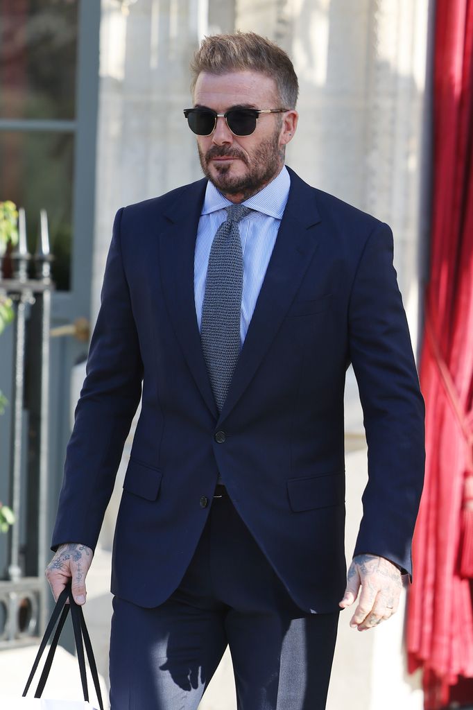 David Beckham is seen leaving his hotel ahead of the Victoria Beckham show