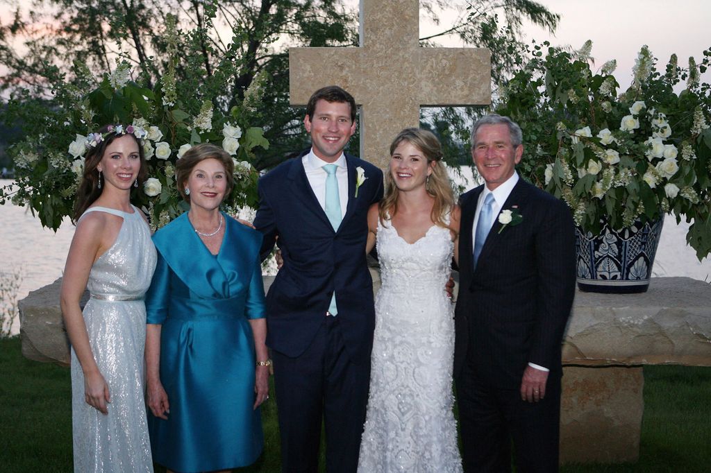 In this handout image provided by the White House, President George W. Bush (R) and Mrs. Laura Bush (2L) and Barbara Bush (L) stand with the new Mr. and Mrs. Henry Hager following the young couple's wedding ceremony at Prairie Chapel Ranch May 10, 2008 near Crawford, Texas