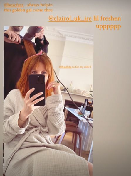 Stacey Dooley posing for a mirror selfie
