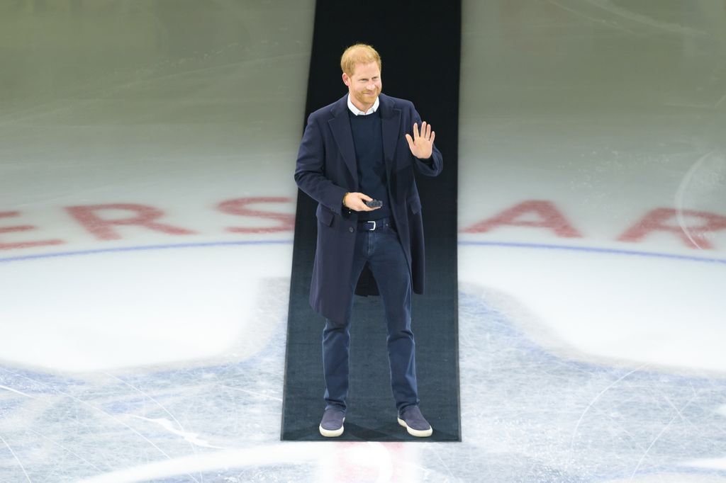 Prince Harry, The Duke of Sussex steps onto the ice for a ceremonial face-off 