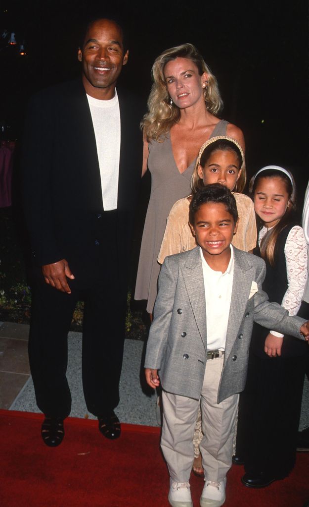 Married American couple OJ Simpson and Nicole Brown Simpson (1959 - 1994), along with their children Justin Sydney, and Jason, attend a screening of 'Naked Gun 33 1/3' at Paramount Studios, Hollywood, California, March 16, 1994. (Photo by Ron Galella, Ltd./Ron Galella Collection via Getty Images)