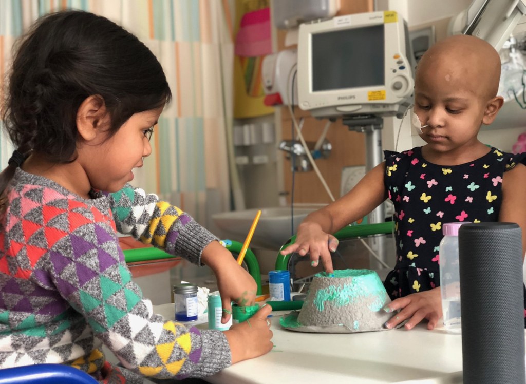 Annika and Kaiya painting in hospital 