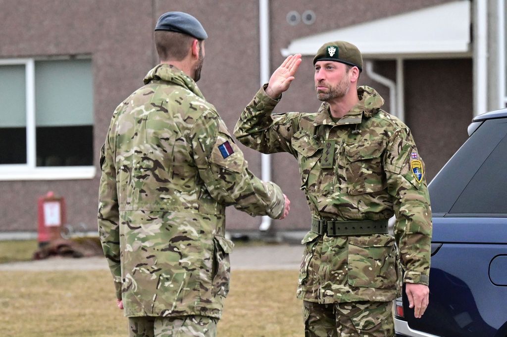 Prince William gives a salute