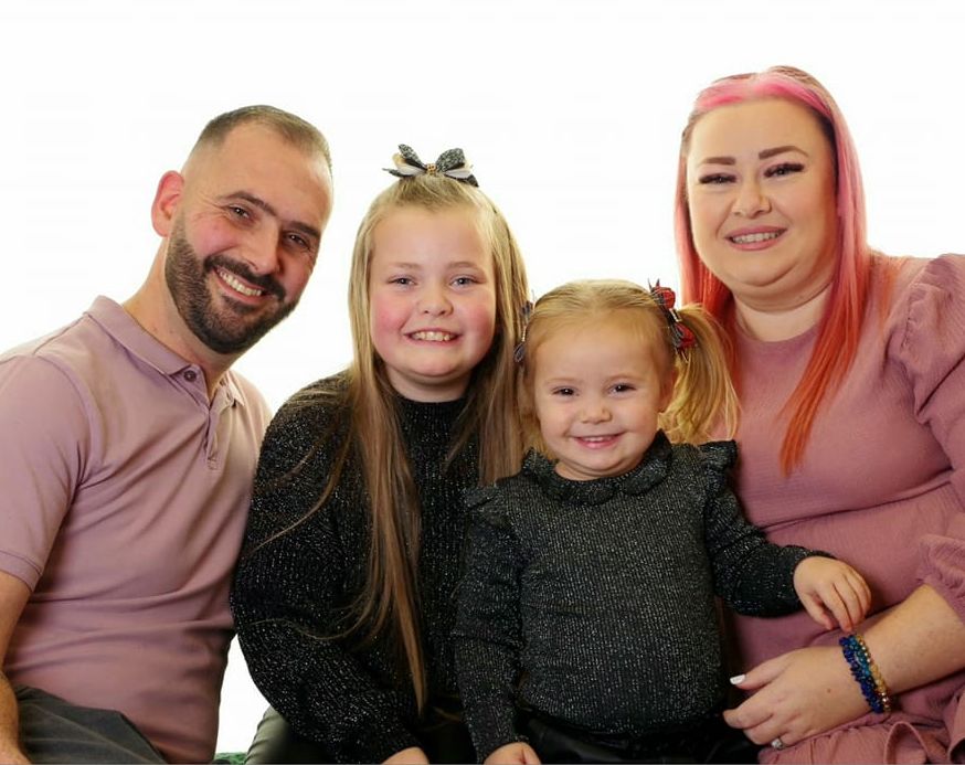 Lisa with her husband and daughters