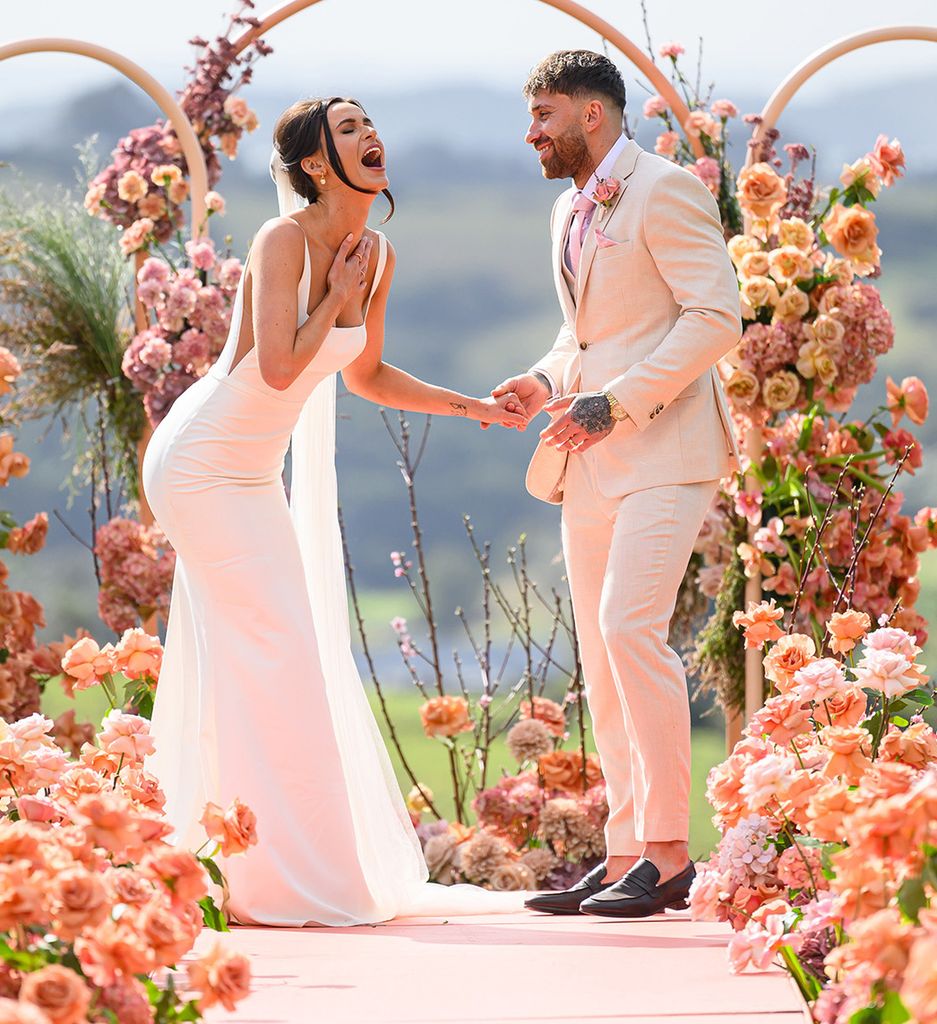 Sierah and Billy laughing together at the end of the aisle on MAFS Australia