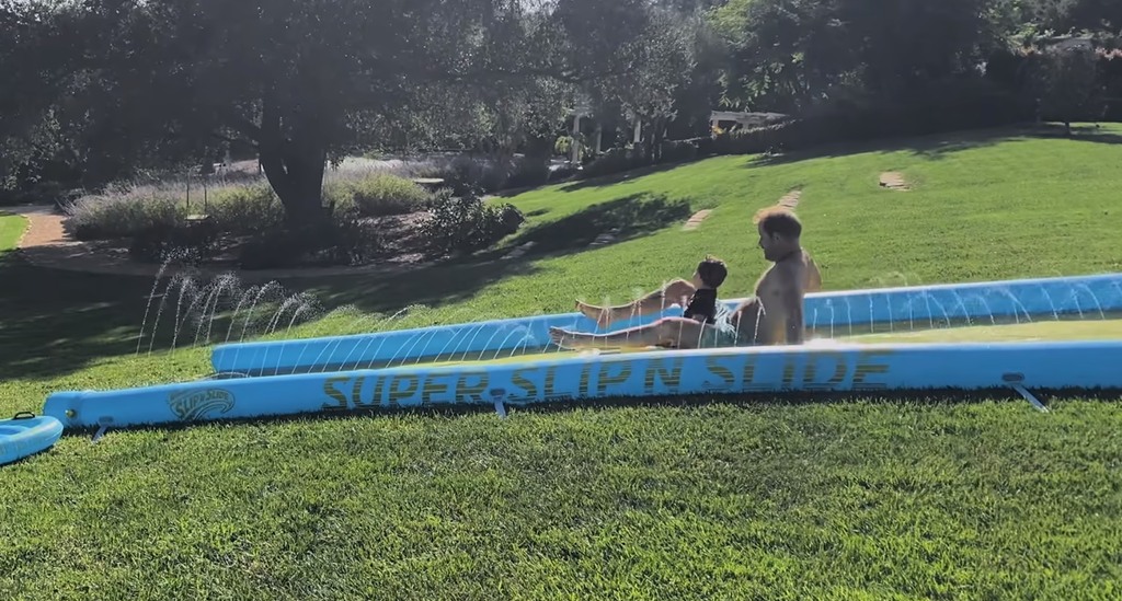 Prince Harry and Meghan's garden has a hill which is perfect for water fun
