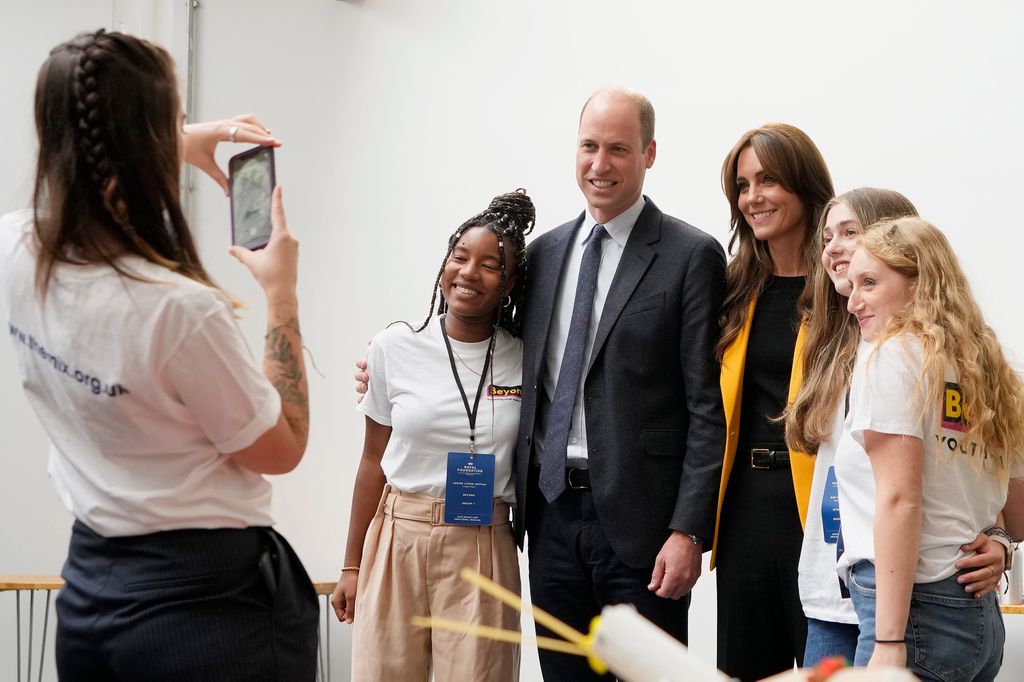 William and Kate pose for a photo at youth forum in Birmingham