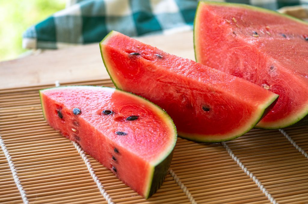 Fresh Watermelon Slices on Bamboo Mat - Perfect Summer Fruit for Hydration and Health