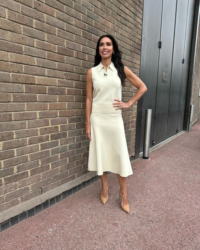 Christine Lampard looked radiant in a skirt and polo top set from Karen Millen