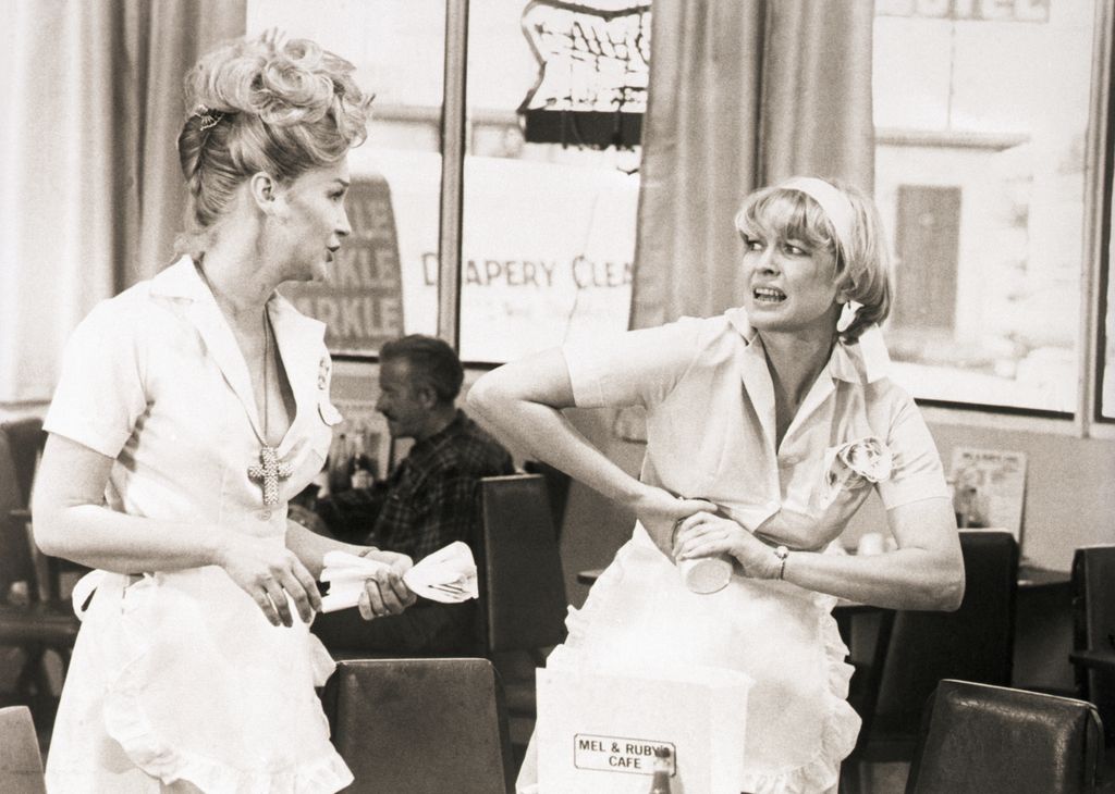 9/1974- Actress Diane Ladd (left) and Ellen Burstyn in a scene from the movie Alice Doesn't Live Here Anymore. Burstyn is shown trying to open a jar as Ladd sets a table in a diner.