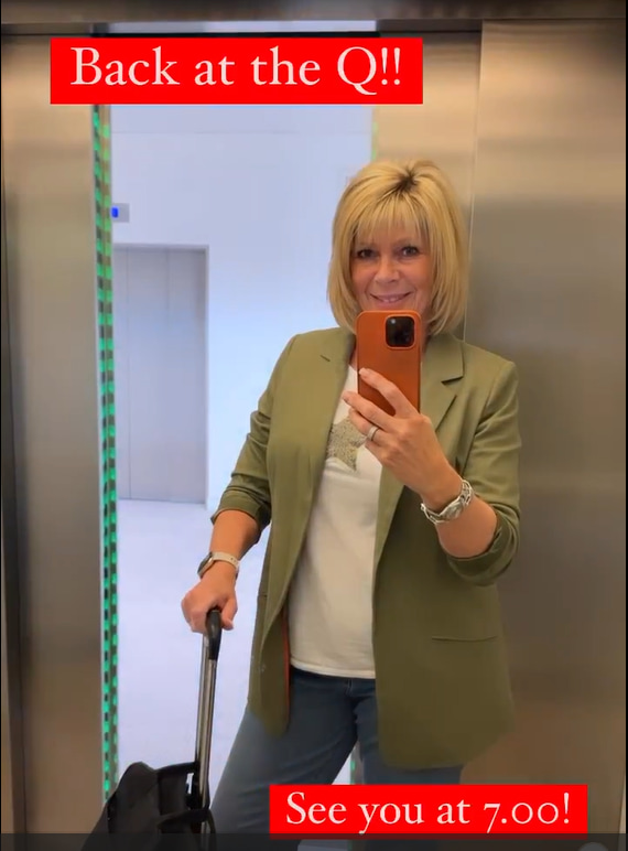 Ruth Langsford posing in a lift