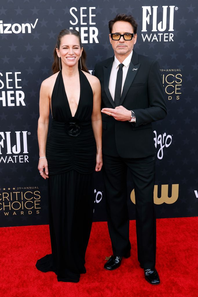 Susan Downey and Robert Downey Jr. attend the 29th Annual Critics Choice Awards at The Barker Hangar on January 14, 2024 in Santa Monica, California.